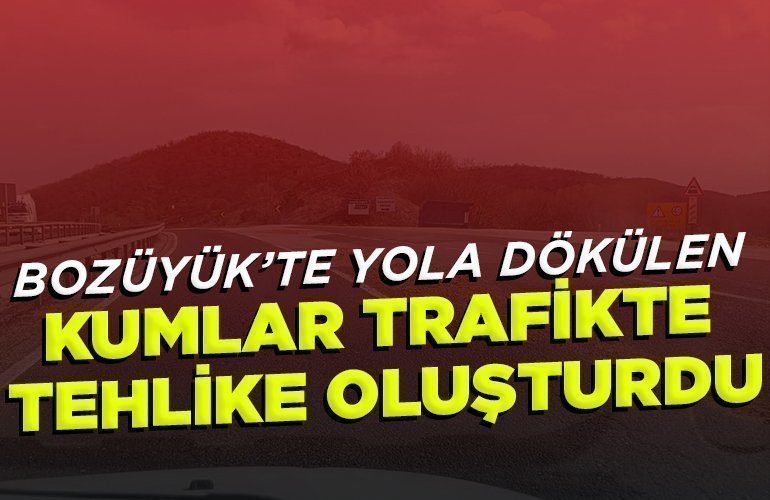 Yola dökülen kumlar trafikte tehlike oluşturdu