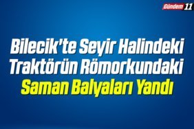 Bilecik'te seyir halindeki traktörün römorkundaki saman balyaları yandı
